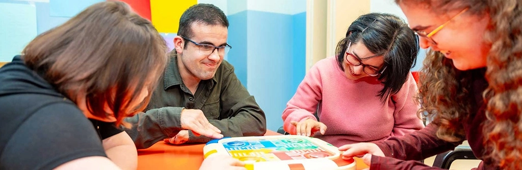 Persons with Disability Playing with toys on a table