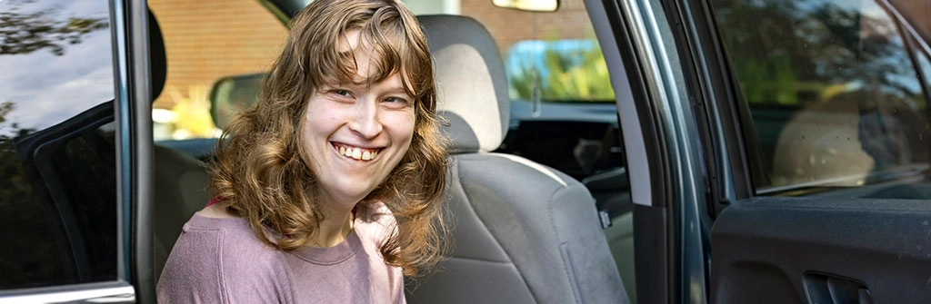 Lady Smiling While Car Door Open 2